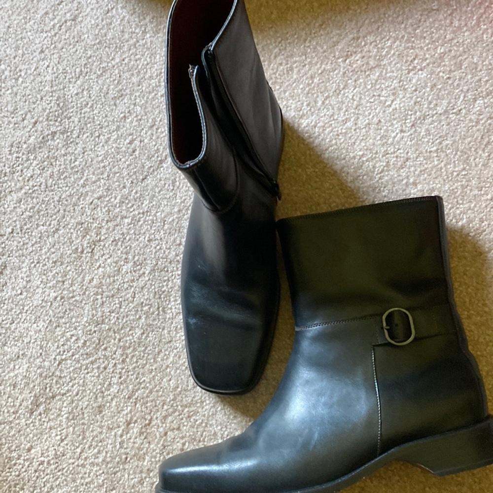 Cole Haan square toe zip up boots with logo embellishment.